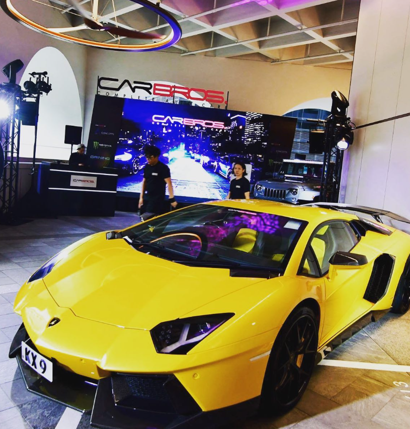 Yellow Lamborghini Aventador at a CarBros showcase event